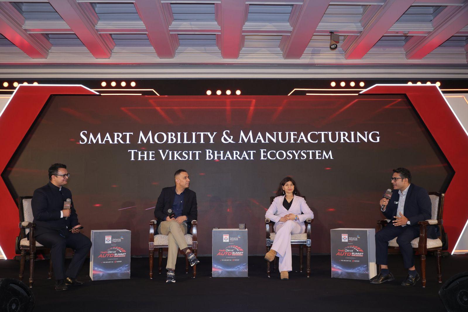Naveen Gupta speaking at the Times Drive Auto Summit